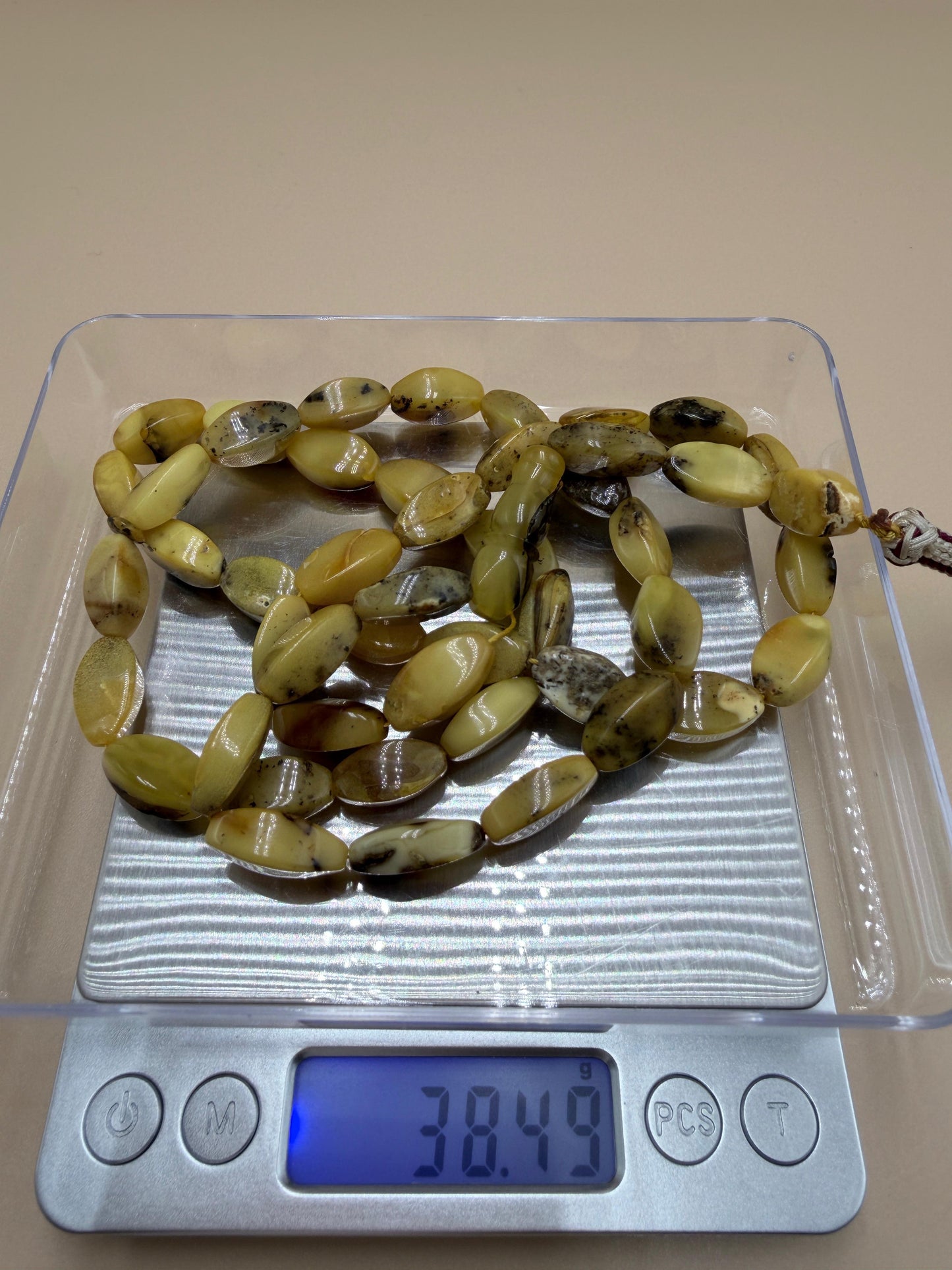 مسباح كهرمان بلطيقي حر شوائبي
قَصّة صابونيةNatural Baltic Amber Misbaha (Inclusion-rich)Soap-shaped cut