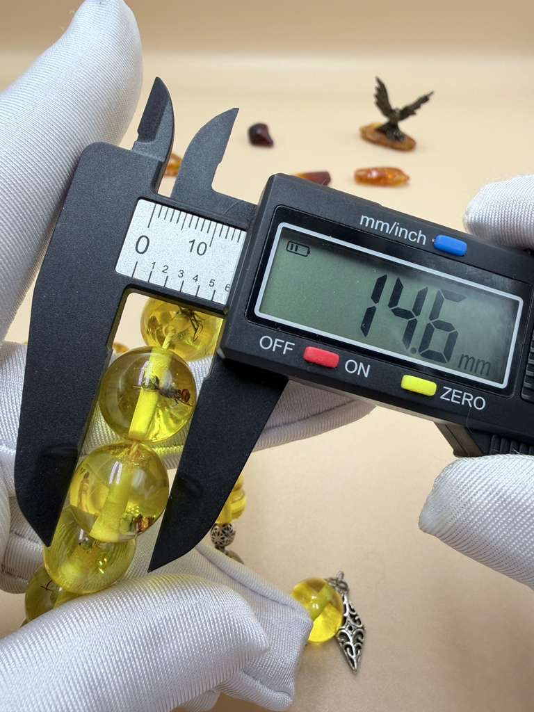 مسباح سندلوس داخله حشرات. Sandalwood Misbaha with natural insects inside.