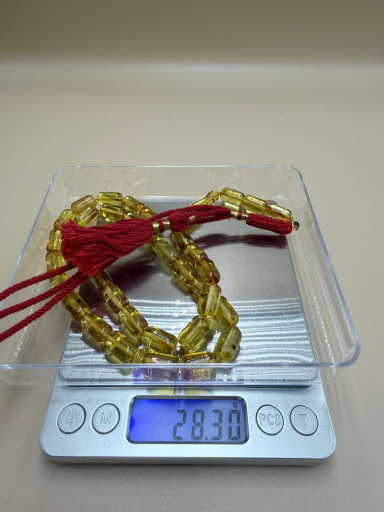 مسباح كهرمان شفاف، قليل الشوائب، مع 3 حبات زيادة Transparent Amber Misbah, Low Inclusions, with 3 Extra Beads.