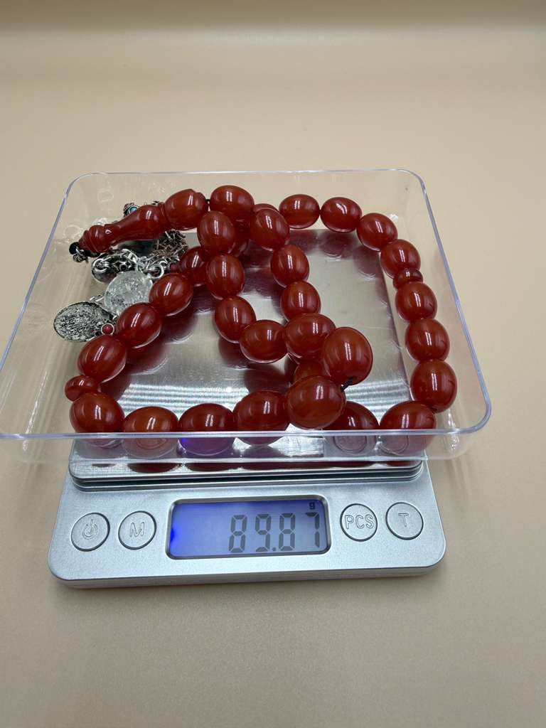 مسباح سندلوس خام من عصيان، مع شرابة فضة عيار 500 Raw Sandalus Misbaha (stick form), with 500-grade silver tassel,