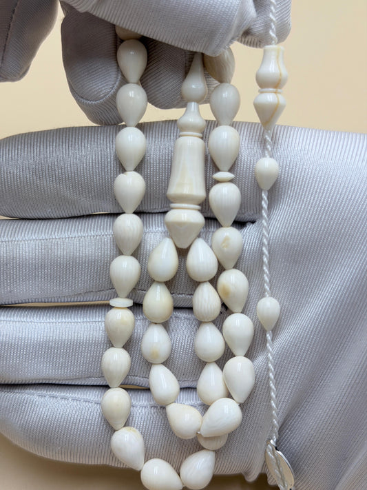 مسباح كفّيه ناب أفريقي، قصة الدمعة.
Misbah – Kafiya African Tusk, Teardrop story.