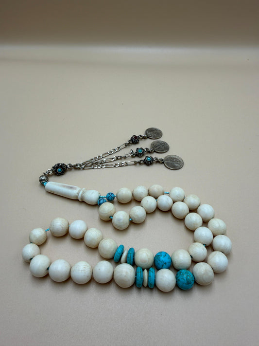مسباح عاج، فواصل فيروز.
Misbah with Turquoise Spacers.