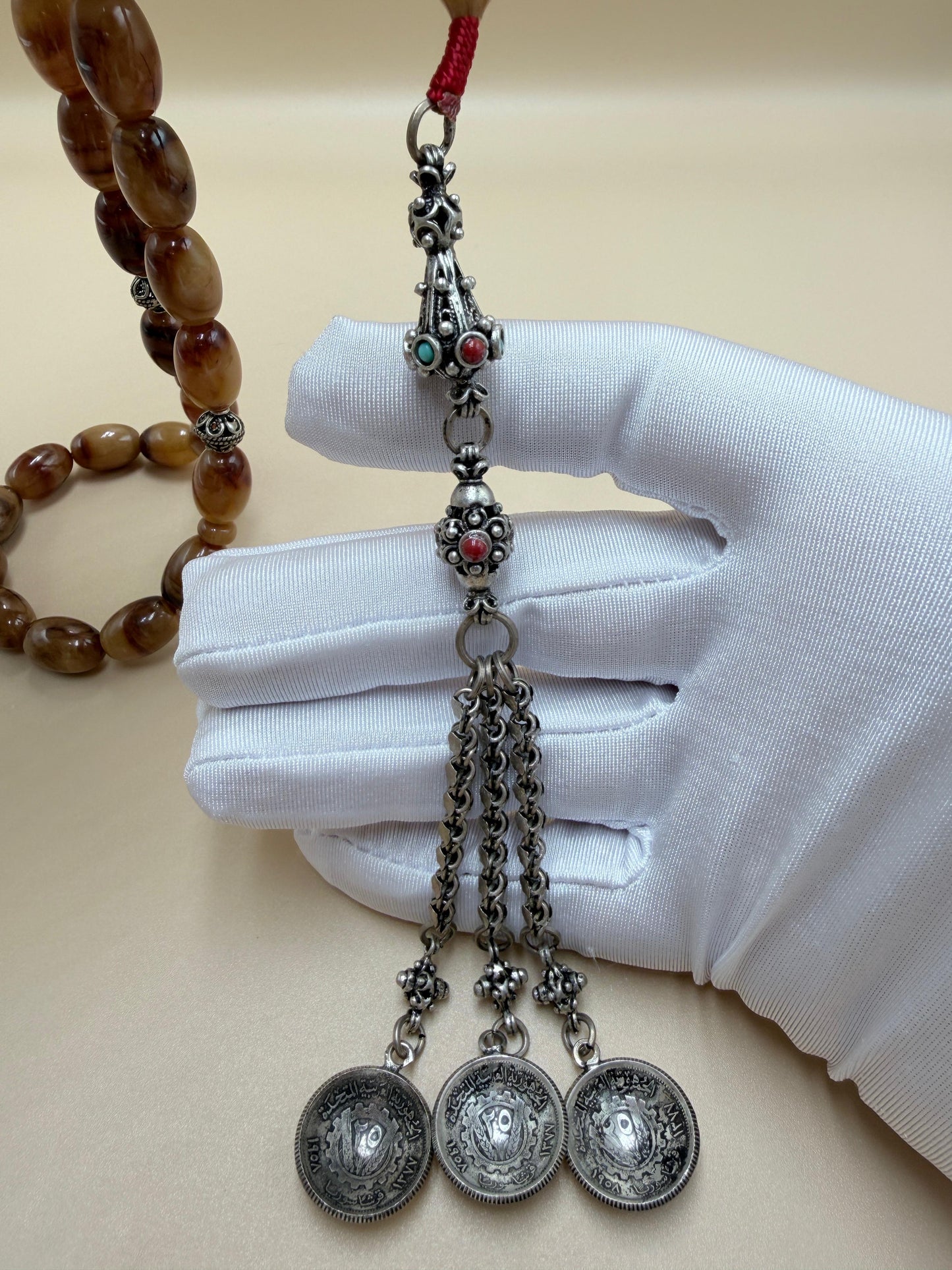 مسباح سندلوس خام عصيان مع شرّابة فضة عيار ٥٠٠. Raw Sandalwood Misbaha with natural stick beads, finished with a 500 silver tassel.