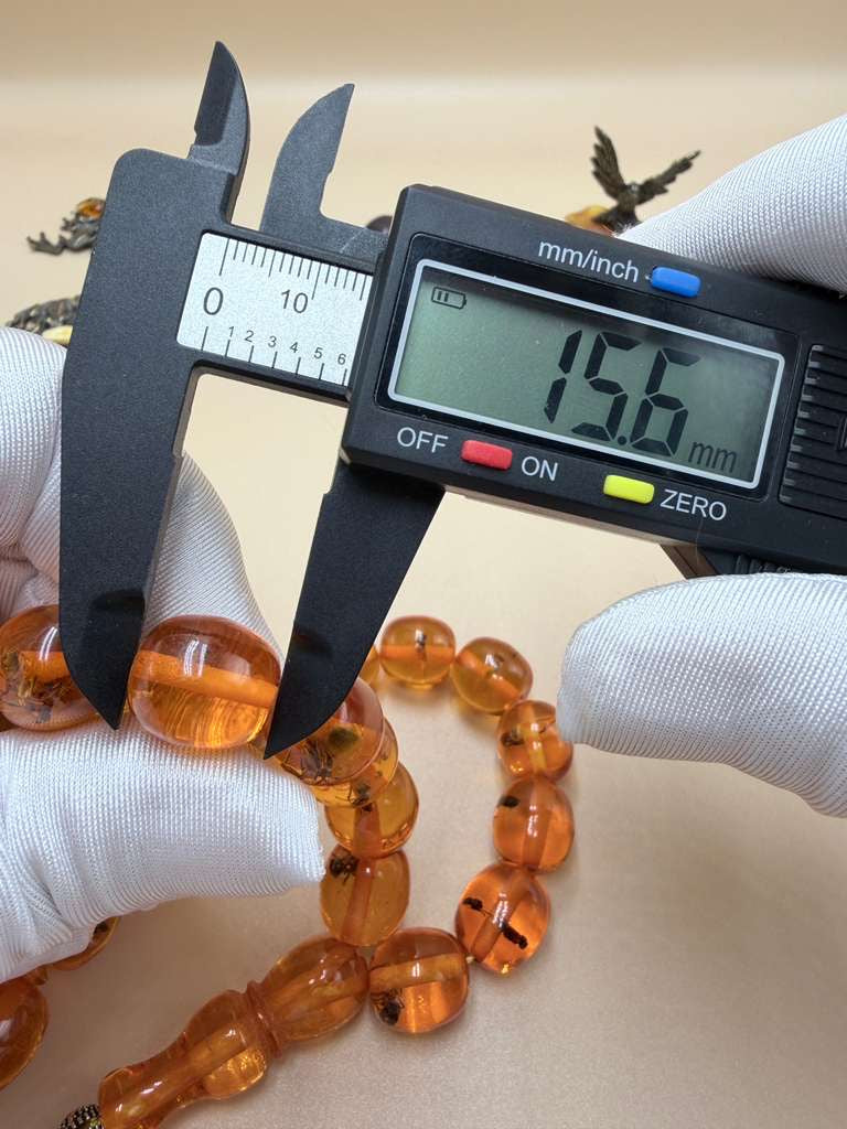 مسباح سندلوس داخله حشرات. Sandalwood Misbaha with natural insects inside.