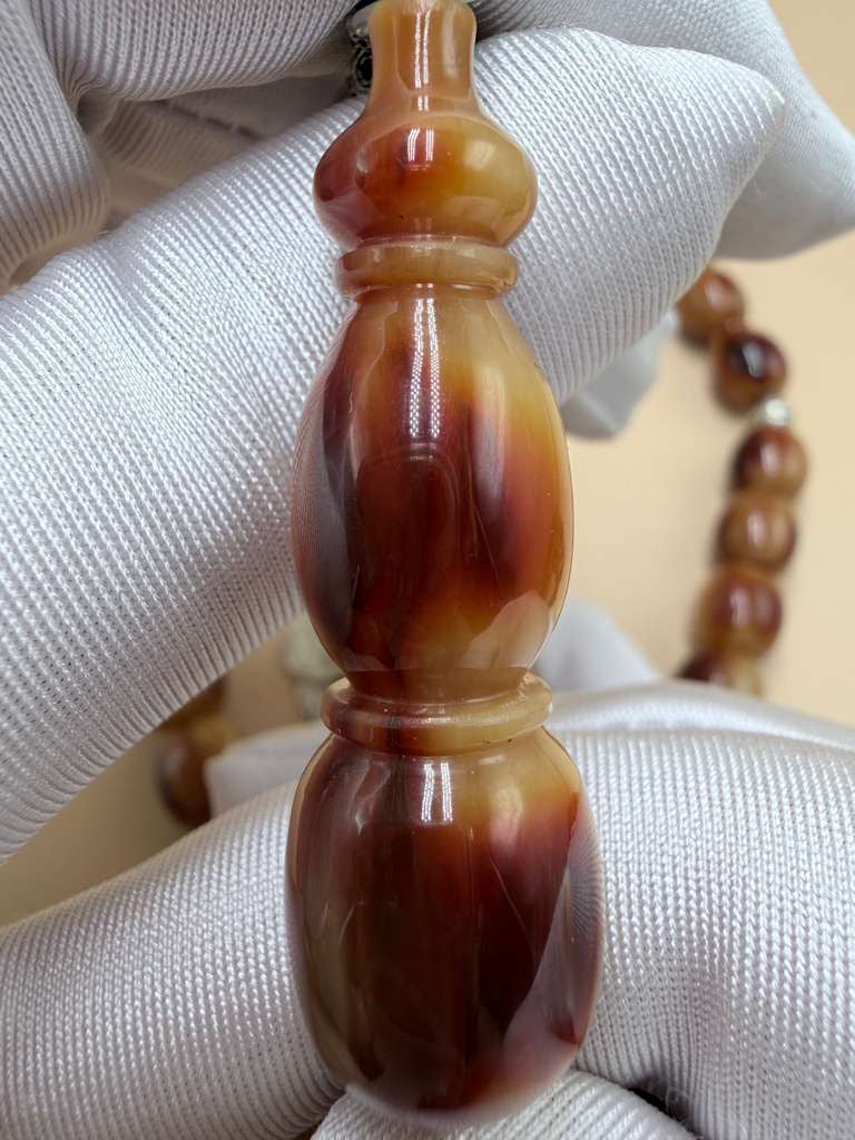 مسباح سندلوس خام عصيان مع شرّابة فضة عيار ٥٠٠. Raw Sandalwood Misbaha with natural stick beads, finished with a 500 silver tassel.
