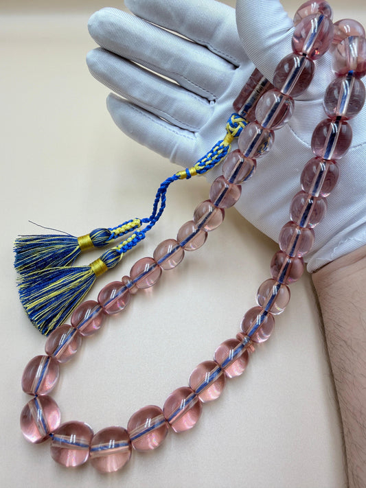 مسباح سندلوس شفاف وردي — قطعة نوادر.

Misbah made of transparent pink Sandalus — a rare piece.