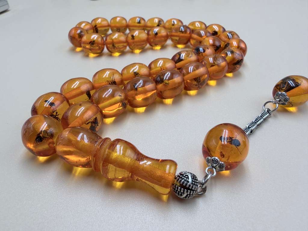 مسباح سندلوس داخله حشرات. Sandalwood Misbaha with natural insects inside.