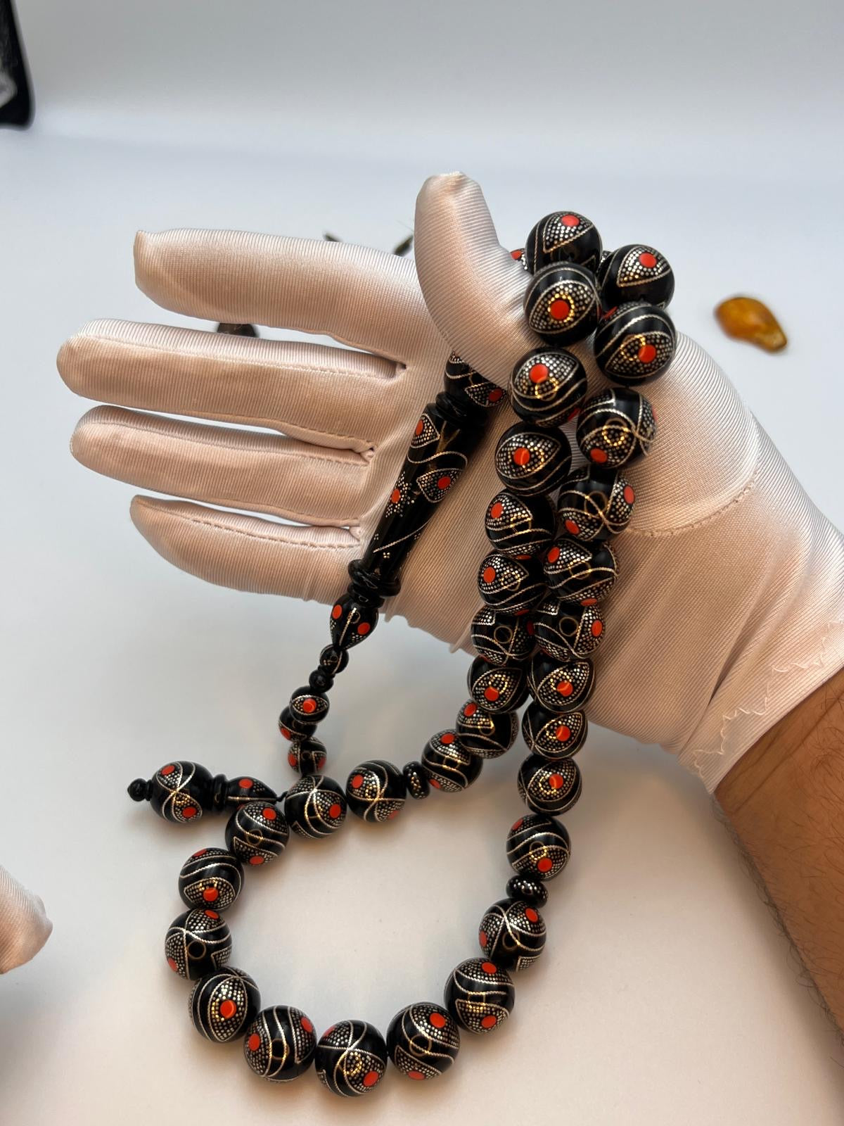 يسر بحر احمر حجم جامبو تطعيم فضة و مرجان Jumbo Red Sea Yusr Misbaha, inlaid with silver and accented with natural coral spacers.