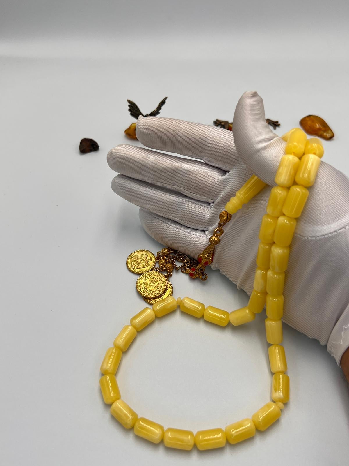 مسباح تراب كهرمان قصة برميلي، 
Amber-dust tasbih with barrel-cut beads,
