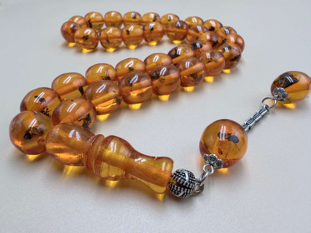 مسباح سندلوس داخله حشرات. Sandalwood Misbaha with natural insects inside.