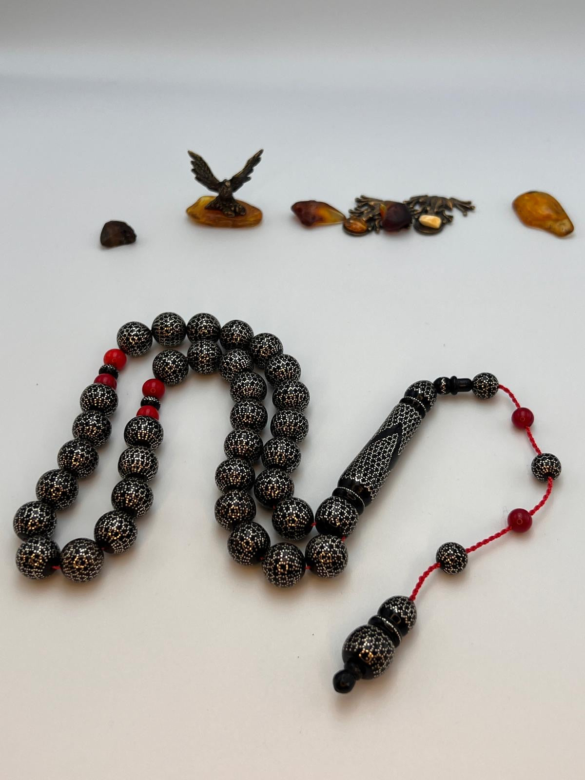 مسباح يسر بحر احمر تطعيم فضه فواصل مرجان yusr rosary with silver