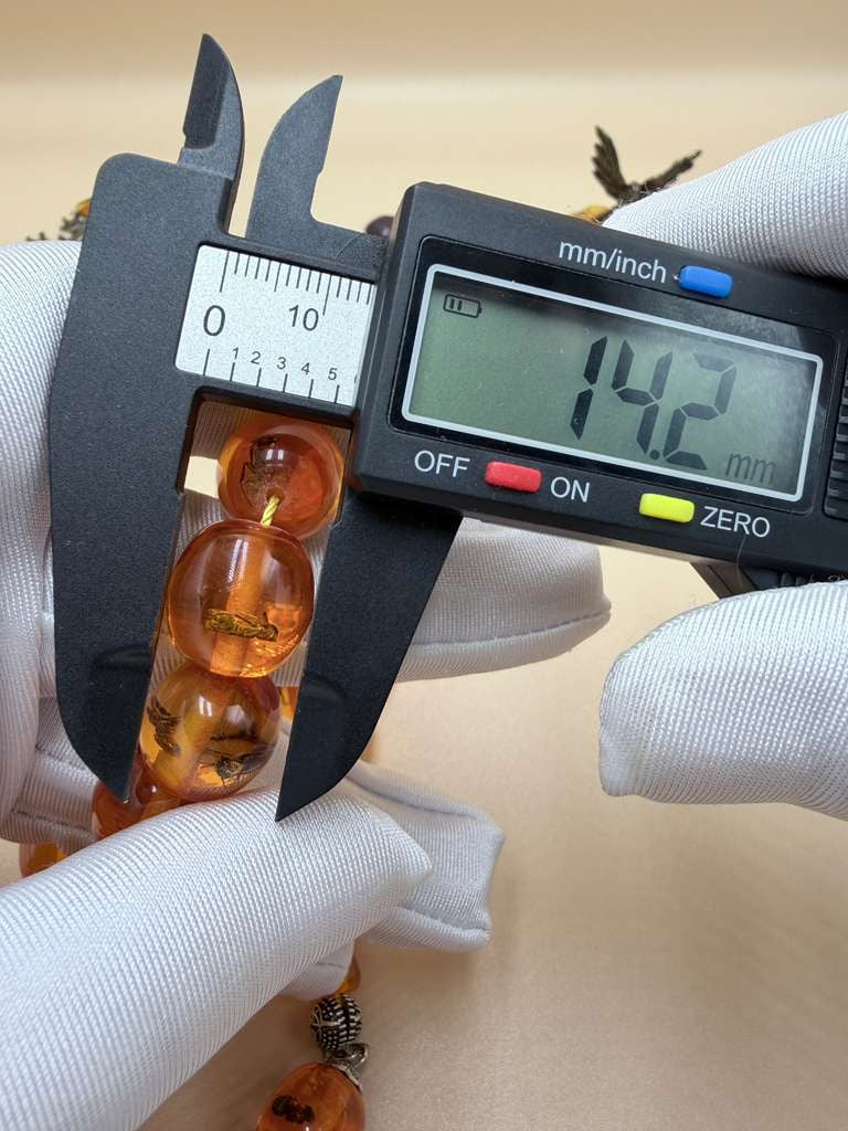 مسباح سندلوس داخله حشرات. Sandalwood Misbaha with natural insects inside.