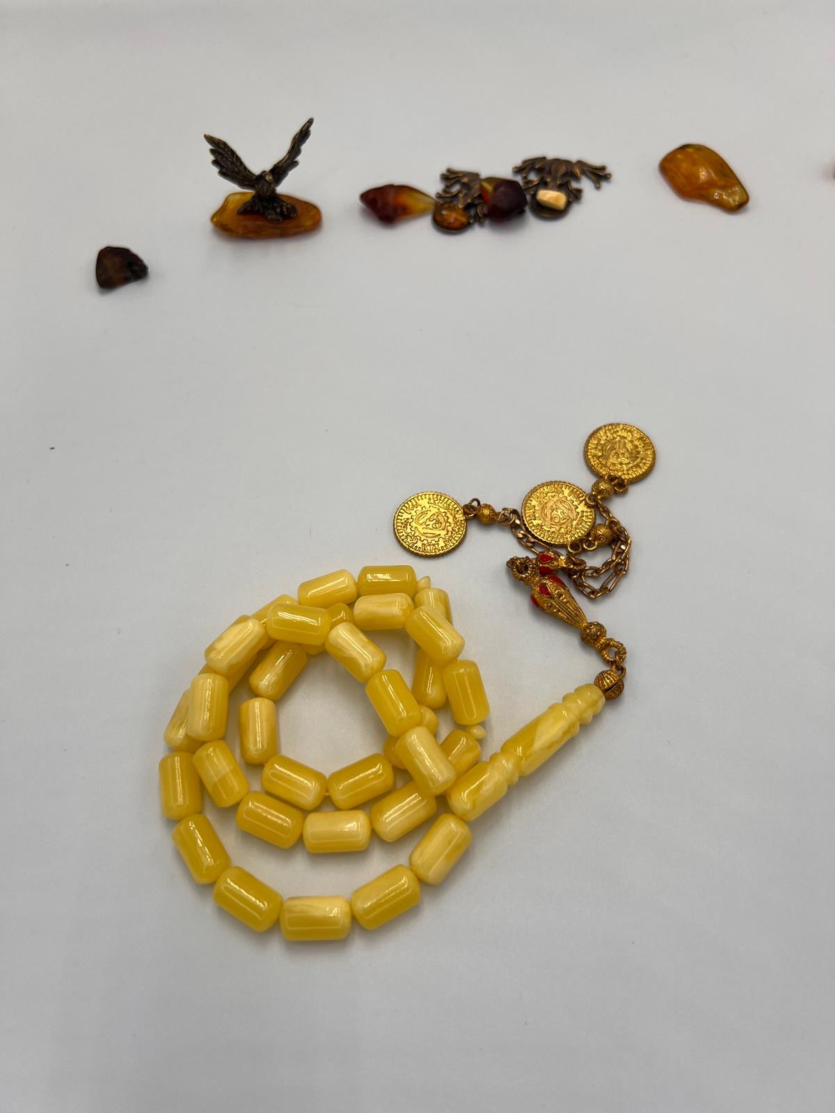 مسباح تراب كهرمان قصة برميلي، 
Amber-dust tasbih with barrel-cut beads,