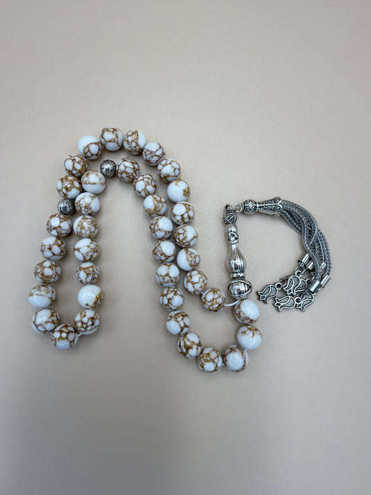 مسباح حجر الهوليت طبيعي بلون المميز 

Howlite Stone Misbaha.