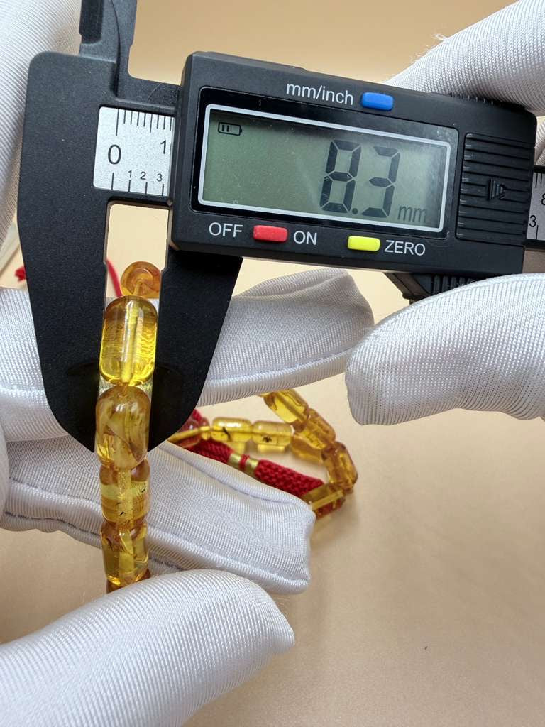 مسباح كهرمان شفاف، قليل الشوائب، مع 3 حبات زيادة  Transparent Amber Misbah, Low Inclusions, with 3 Extra Beads.