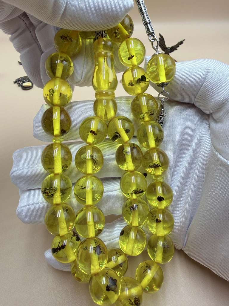 مسباح سندلوس داخله حشرات. Sandalwood Misbaha with natural insects inside.