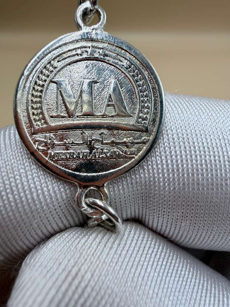 مسباح كوك، مطعّم صدف، خراطة مسباح السواح.
Kuka Wood Misbah, Inlaid with Mother of Pearl, Handcrafted by Al-Sawah Rosary Workshop.