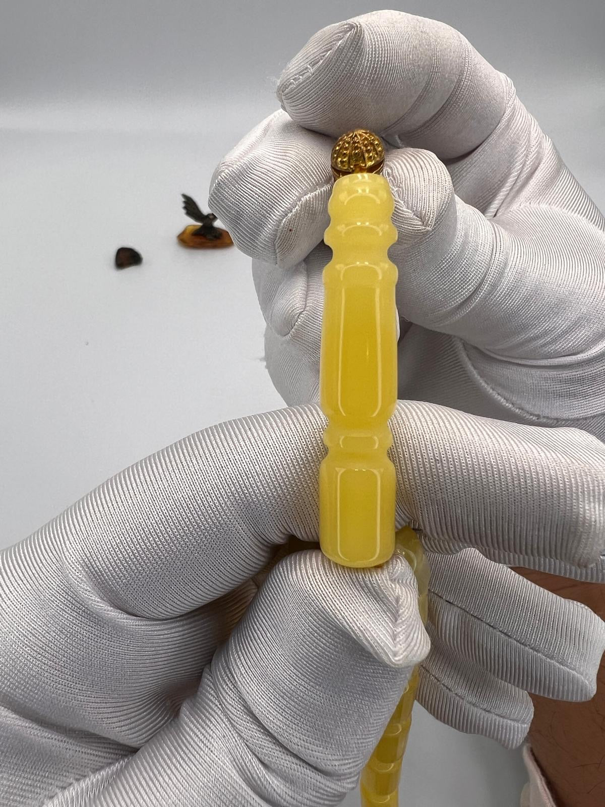 مسباح تراب كهرمان قصة برميلي، 
Amber-dust tasbih with barrel-cut beads,