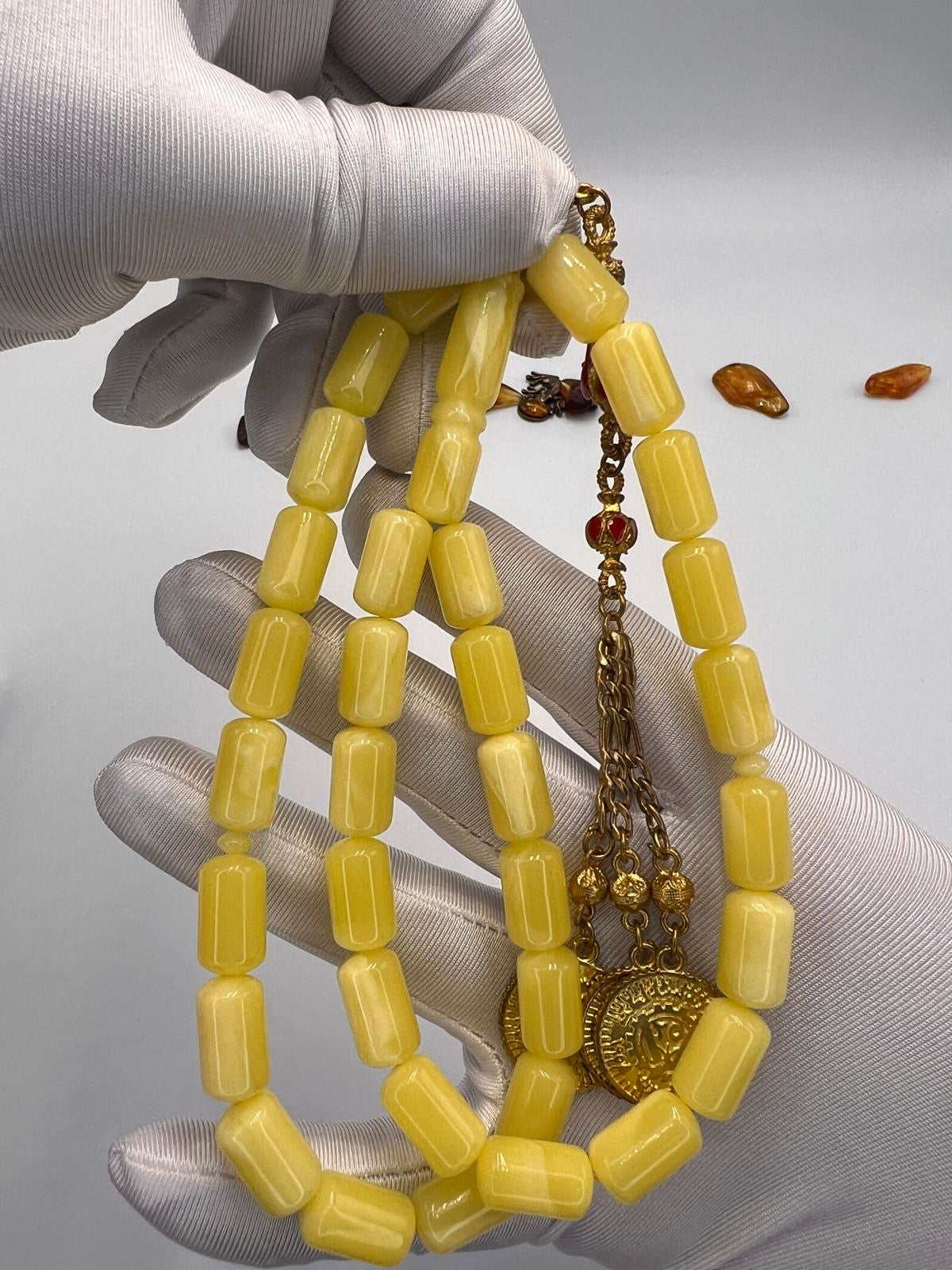 مسباح تراب كهرمان قصة برميلي، 
Amber-dust tasbih with barrel-cut beads,
