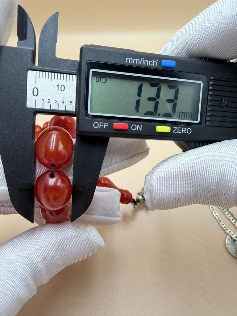 مسباح سندلوس خام من عصيان، مع شرابة فضة عيار 500 Raw Sandalus Misbaha (stick form), with 500-grade silver tassel,