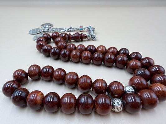 فاتوران عرق أصفر — صب جديدNew-cast Faturan with yellow grain — clean material with clear shine.