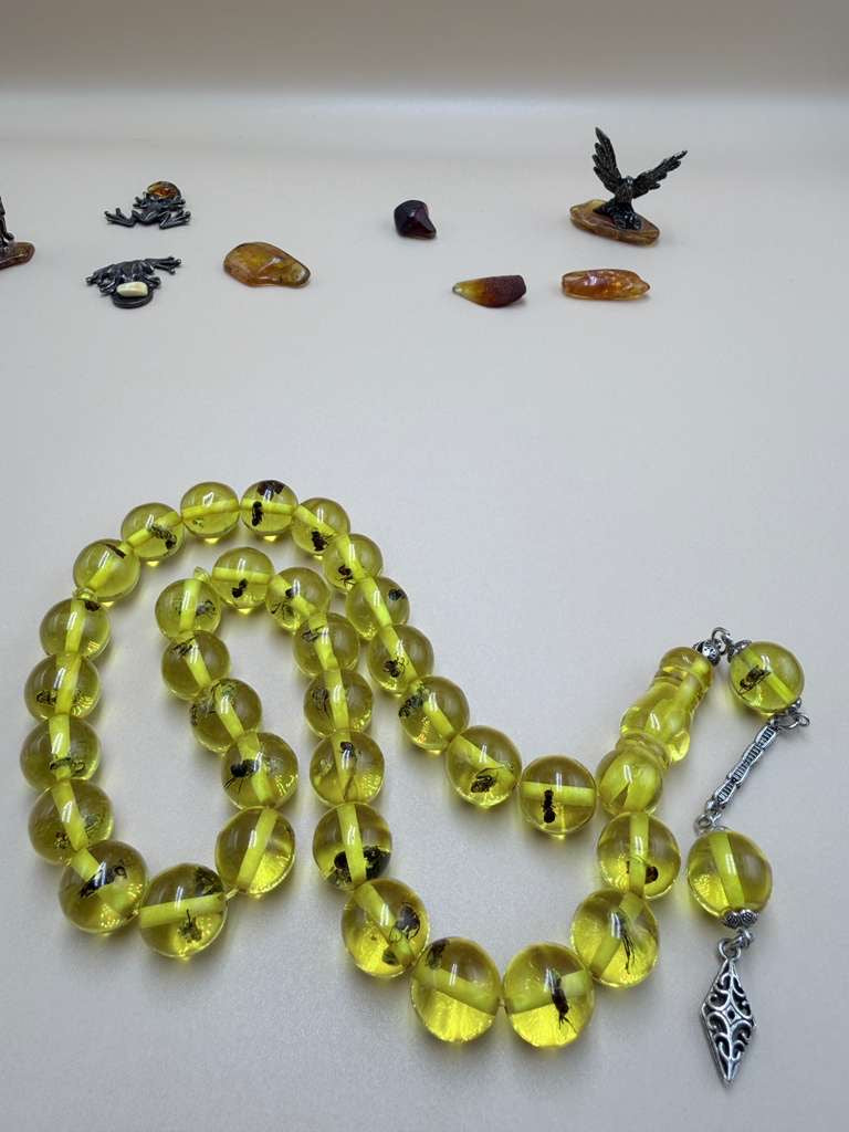 مسباح سندلوس داخله حشرات. Sandalwood Misbaha with natural insects inside.