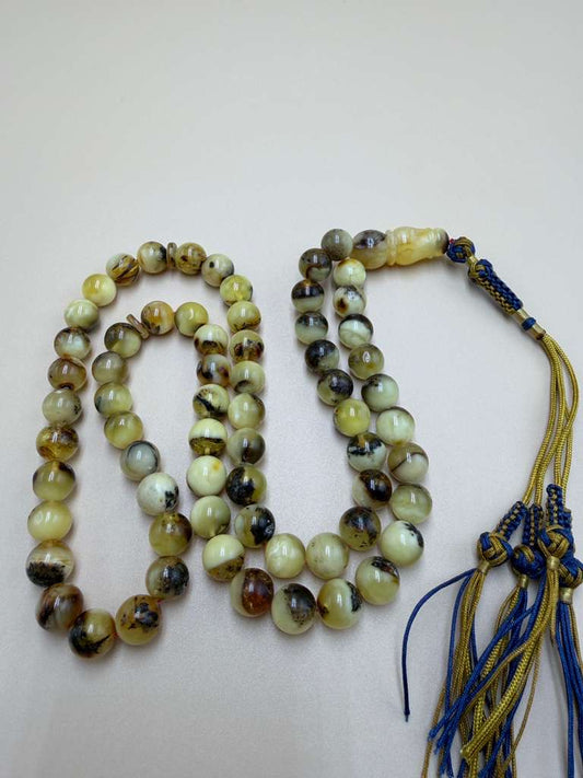 مسباح كهرمان بلطيقي حر شوائبي
Natural Baltic Amber Misbaha (Inclusion-rich)